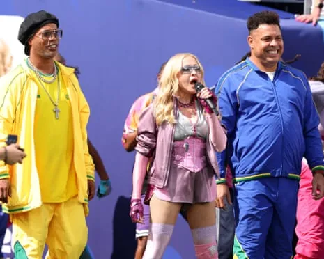 Ronaldinho, Madonna and Ronaldo during the half-time show at the World Cup final