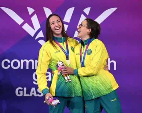 Lani Pallister and Jenna Forrester celebrate their gold and bronze medals in the 400m freestyle as Australia dominate day one at the Commonwealth Games