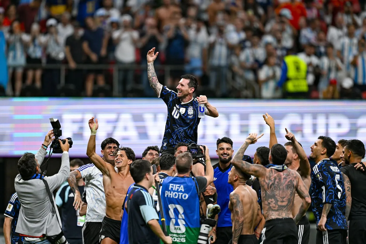 Argentina players lift Lionel Messi on their shoulders following the conclusion of the World Cup semi-final against England. Photo / Photosport